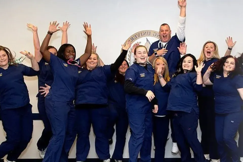 Nursing School Students in Scrubs Celebrating